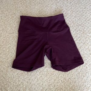 Purple compression shorts